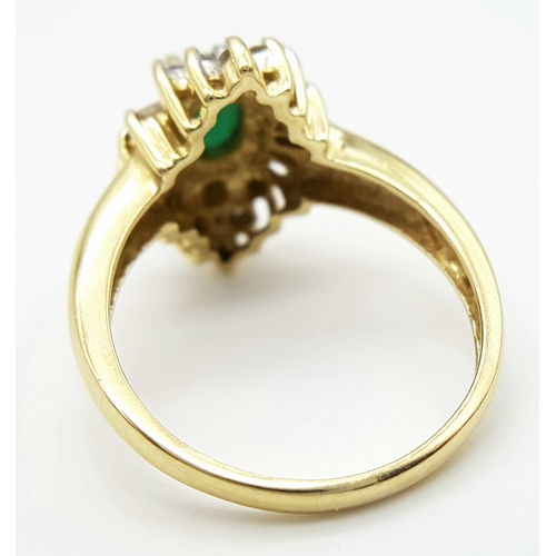 403 - A Stunning 14 Carat Yellow Gold, Art Deco Design, Emerald and Diamond Halo Cluster Ring Size M. The ... 