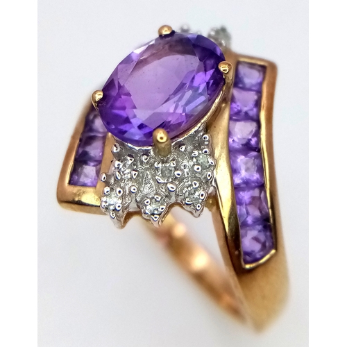 417 - A Hallmarked 2004 9 Carat Yellow Gold Amethyst and Diamond Art Deco Design Ring Size N. The Ring is ... 