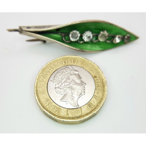 516 - A WW1 Hallmarked 1918 Silver and Enamel Leaf Brooch Set with Clear Stones. 4.5cm Length. Gross Weigh... 