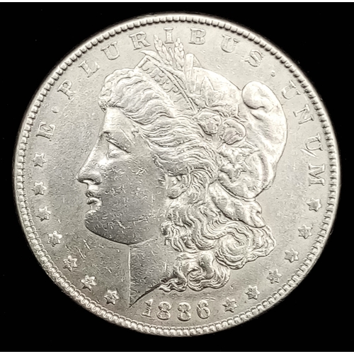 620 - An Extremely Fine 1886 Silver Morgan Dollar- (Graded on the Sheldon Scale-XF45). Gross Weight 26.8 G... 