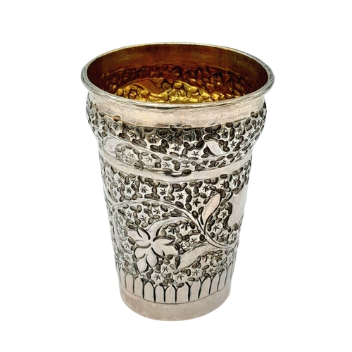 1323 - A Vintage Silver Kiddush Cup. Chased floral decoration. 34g. 7cm