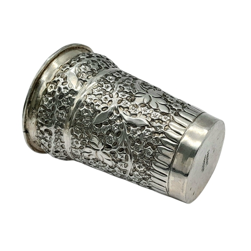 1323 - A Vintage Silver Kiddush Cup. Chased floral decoration. 34g. 7cm