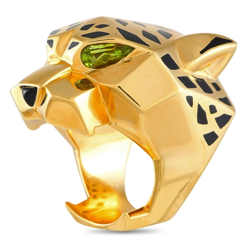 563 - An iconic Cartier Panthere 18K Yellow Gold Lacquer Ring. Black lacquer accents and green gemstone ey... 