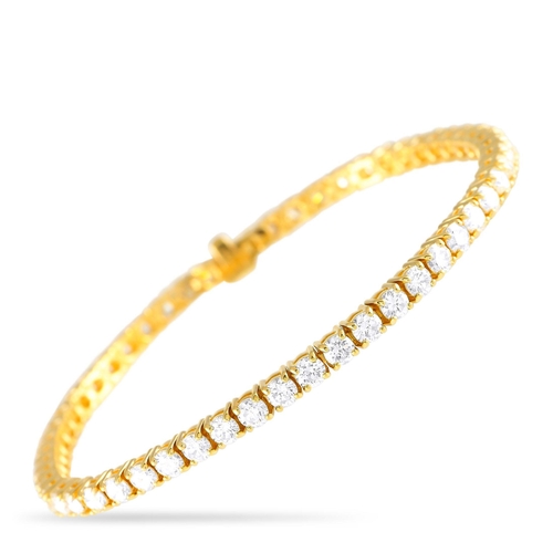 593 - An 18K Yellow Gold 6.63ct Diamond Tennis Bracelet. A series of sparkling Diamonds totaling 6.63 cara... 