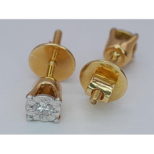 103 - A PAIR OF 18K YELLOW GOLD DIAMOND SET STUD EARRINGS WITH SCREW BACK FITTINGS 1.8G TOTAL WEIGHT. Ref:... 