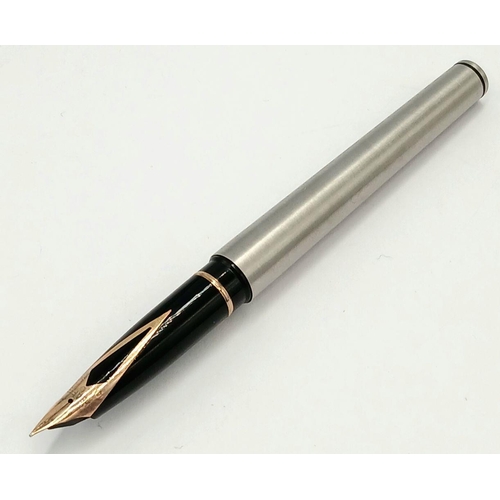 105 - Vintage SHEAFFER FOUNTAIN PEN finished in brushed stainless steel . Having a 14 Carat Gold Nib. Exce... 