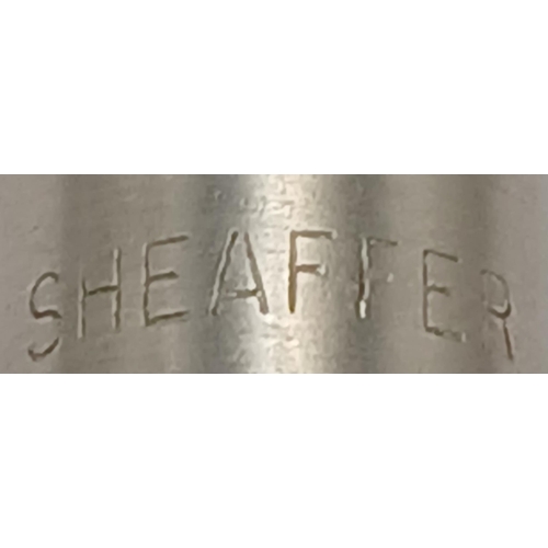 105 - Vintage SHEAFFER FOUNTAIN PEN finished in brushed stainless steel . Having a 14 Carat Gold Nib. Exce... 