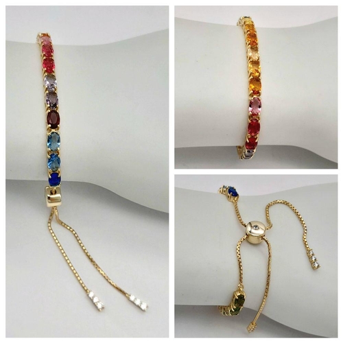 1076 - A Yellow Gold Gilt Sterling Silver Multi Colour Stone Pull Through Bracelet. One Size Adjustable Fit... 