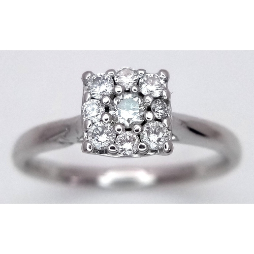 110 - AN 18K WHITE GOLD DIAMOND CLUSTER RING 0.25CT , 2.4G TOTAL WEIGHT, SIZE K. Ref: SC 9006