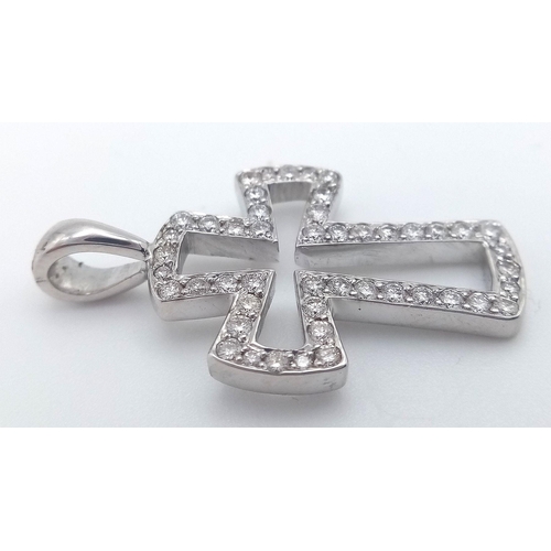 114 - AN 18K WHITE GOLD DIAMOND SET CROSS 1.5CM x 3CM, 3.8G TOTAL WEIGHT. Ref: SC 2048