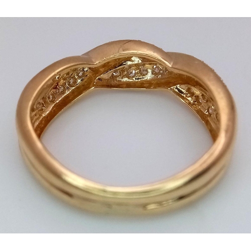 117 - A 14K YELLOW GOLD DIAMOND CROSSOVER BAND RING 0.26CT , 3.5G SIZE M 1/2. Ref: SC 9003