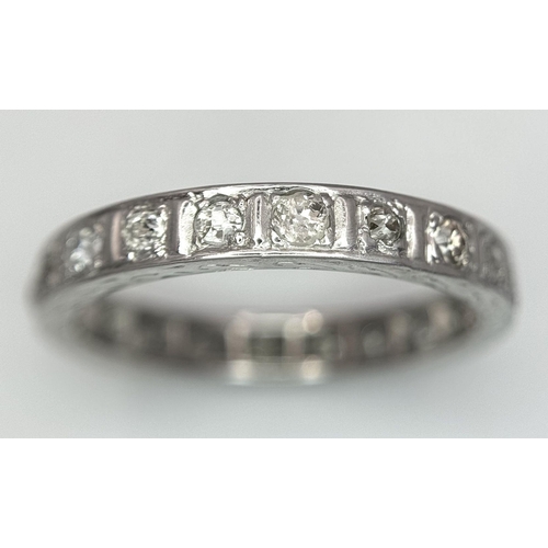 134 - A 9K WHITE GOLD DIAMOND FULL ETERNITY RING 0.70CT , 3.2G TOTAL WEIGHT, SIZE R. Ref: SC 2025