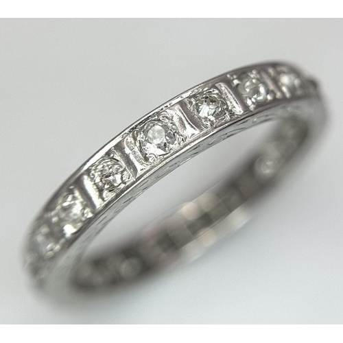 134 - A 9K WHITE GOLD DIAMOND FULL ETERNITY RING 0.70CT , 3.2G TOTAL WEIGHT, SIZE R. Ref: SC 2025