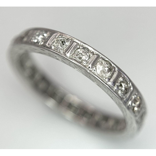 134 - A 9K WHITE GOLD DIAMOND FULL ETERNITY RING 0.70CT , 3.2G TOTAL WEIGHT, SIZE R. Ref: SC 2025