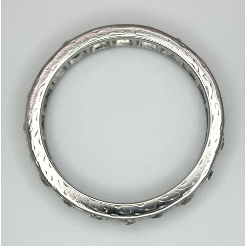 134 - A 9K WHITE GOLD DIAMOND FULL ETERNITY RING 0.70CT , 3.2G TOTAL WEIGHT, SIZE R. Ref: SC 2025