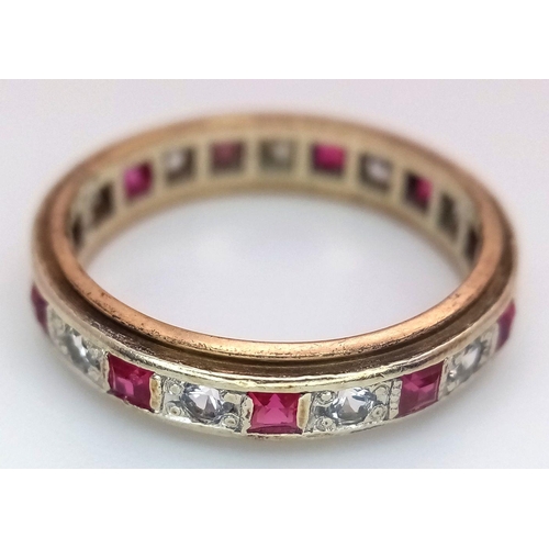 179 - A 9K YELLOW GOLD DIAMOND & RUBY FULL ETERNITY RING. 3G. SIZE N. ADAM2003.