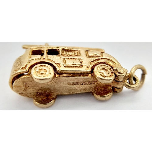 191 - A 9K YELLOW GOLD VINTAGE FIRE ENGINE / TRUCK CHARM WHICH OPENS AND ALSO HAS A LADDER THAT RISES 1.5C... 