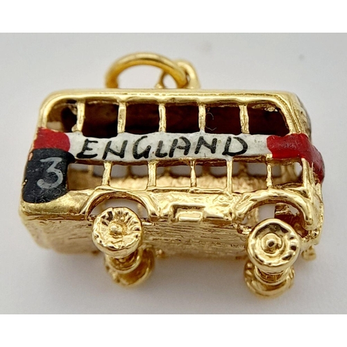 206 - A 9K YELLOW GOLD ENAMELLED LONDON DOUBLE DECKER BUS CHARM WITH MOVING WHEELS 1CM x 1.8CM, 2.9G TOTAL... 