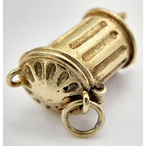 211 - A 9K YELLOW GOLD DUSTBIN CHARM WHICH OPENS TO REVEAL THE FISHBONES WHICH ALSO COME OUT 1.5CM x 1CM, ... 