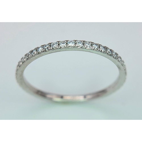 212 - AN 18K WHITE GOLD ALMOST FULL SET DIAMOND ETERNITY RING 0.30CT , 1.5G TOTAL WEIGHT, SIZE N 1/2. Ref:... 