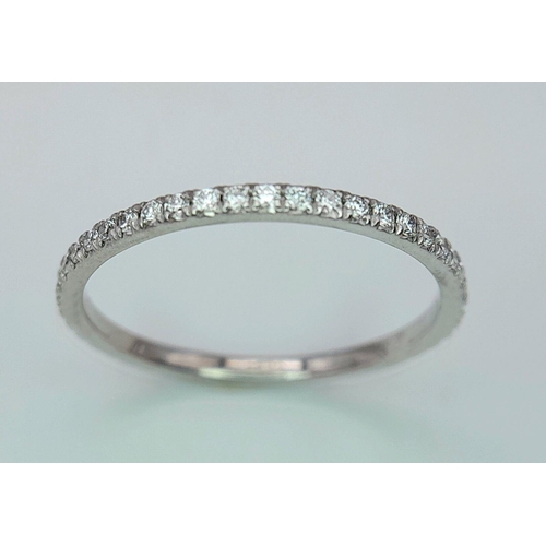 212 - AN 18K WHITE GOLD ALMOST FULL SET DIAMOND ETERNITY RING 0.30CT , 1.5G TOTAL WEIGHT, SIZE N 1/2. Ref:... 