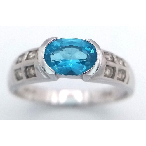 225 - A 9K WHITE GOLD DIAMOND & LONDON BLUE TOPAZ RING 2.4G TOTAL WEIGHT, SIZE M. Ref: SC 2003