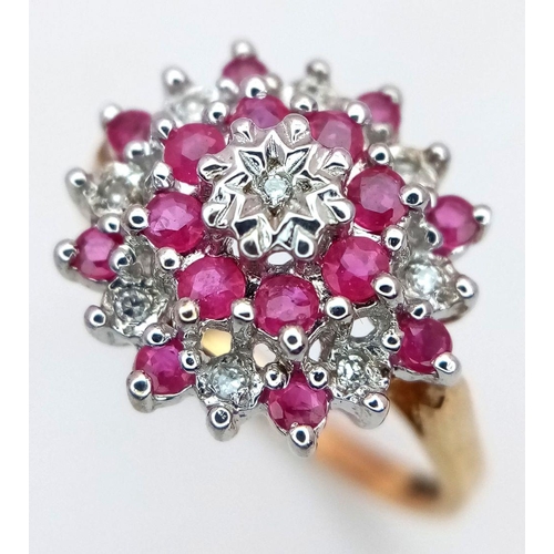 270 - A 9K YELLOW GOLD DIAMOND & RUBY CLUSTER RING 2.3G TOTAL WEIGHT, SIZE L. Ref: SC 2009