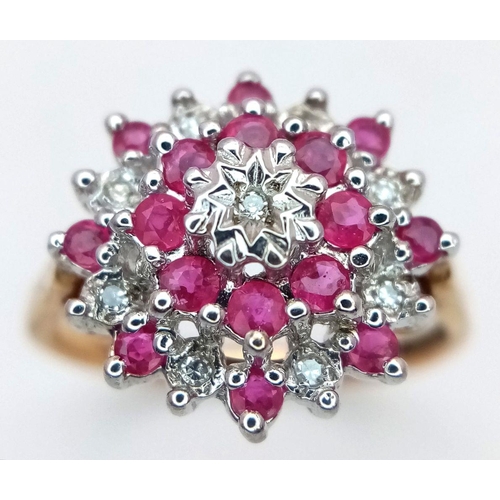 270 - A 9K YELLOW GOLD DIAMOND & RUBY CLUSTER RING 2.3G TOTAL WEIGHT, SIZE L. Ref: SC 2009