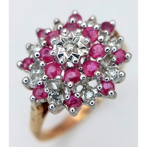 270 - A 9K YELLOW GOLD DIAMOND & RUBY CLUSTER RING 2.3G TOTAL WEIGHT, SIZE L. Ref: SC 2009