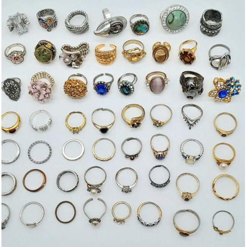 28 - Enormous selection of DRESS RINGS. To include Jewelled ,Gold Tone, Silver Tone, etc. Many Show stopp... 