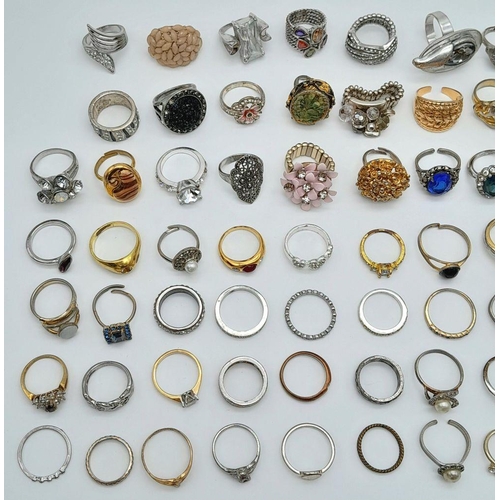 28 - Enormous selection of DRESS RINGS. To include Jewelled ,Gold Tone, Silver Tone, etc. Many Show stopp... 