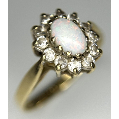 341 - A 9K YELLOW GOLD OPAL AND CZ CLUSTER RING, 1.6G TOTAL WEIGHT, SIZE J. REF: SH1856I