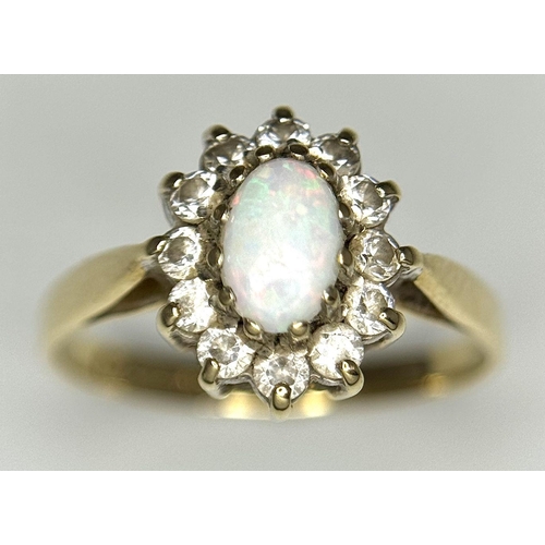 341 - A 9K YELLOW GOLD OPAL AND CZ CLUSTER RING, 1.6G TOTAL WEIGHT, SIZE J. REF: SH1856I