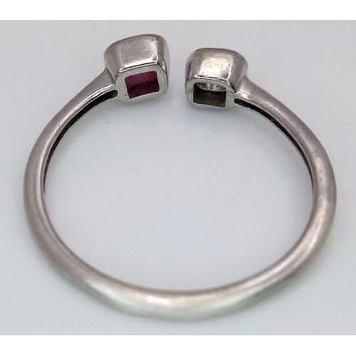 438 - A Unisex Sterling Silver Ruby & Diamond Ring Size T. The ring is set with a 4mm Square Cut Ruby and ... 