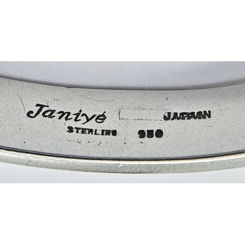 447 - A STERLING SILVER 950 FANCY COILED END TORQUE ID BANGLE - MADE BY JANIYE IN JAPAN. 19G. TONY2001