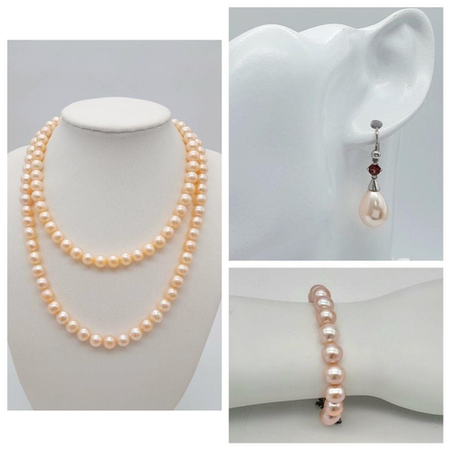 461 - A CULTURED PEARL NECKLACE, BRACELET & DROP EARRING SUITE - WITH STERLING SILVER FITTINGS. NECKLACE -... 