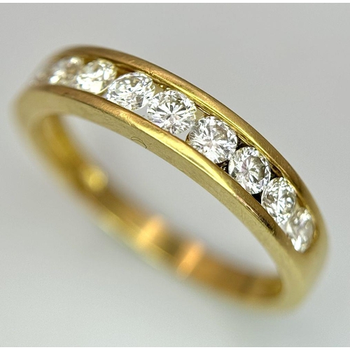 52 - AN 18K YELLOW GOLD CHANNEL SET DIAMOND HALF ETERNITY RING 0.75CT, 3.5G TOTAL WEIGHT, SIZE S. Ref: SC... 