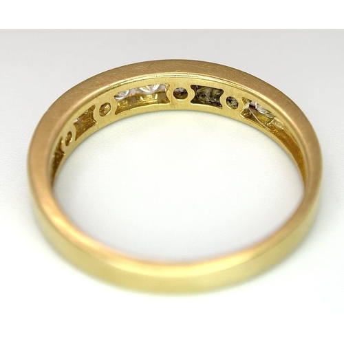 52 - AN 18K YELLOW GOLD CHANNEL SET DIAMOND HALF ETERNITY RING 0.75CT, 3.5G TOTAL WEIGHT, SIZE S. Ref: SC... 