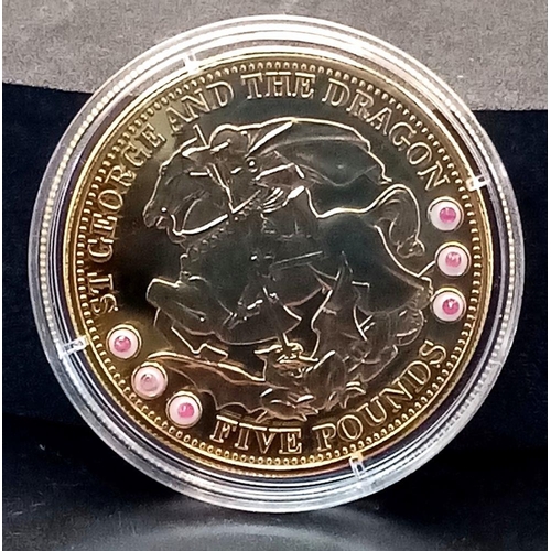 599 - A Mint Condition 2009 Gold Plated Sterling Silver, £5 St George Coin, Set with Six Round Cut Rubies.... 