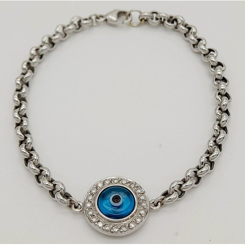 66 - AN 18K WHITE GOLD DIAMOND SET EVIL EYE BRACELET 14CM LENGTH, 4.2G TOTAL WEIGHT. Ref: SC 9007