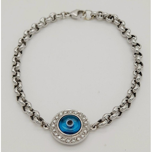 66 - AN 18K WHITE GOLD DIAMOND SET EVIL EYE BRACELET 14CM LENGTH, 4.2G TOTAL WEIGHT. Ref: SC 9007