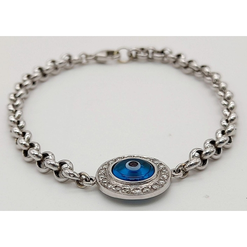 66 - AN 18K WHITE GOLD DIAMOND SET EVIL EYE BRACELET 14CM LENGTH, 4.2G TOTAL WEIGHT. Ref: SC 9007