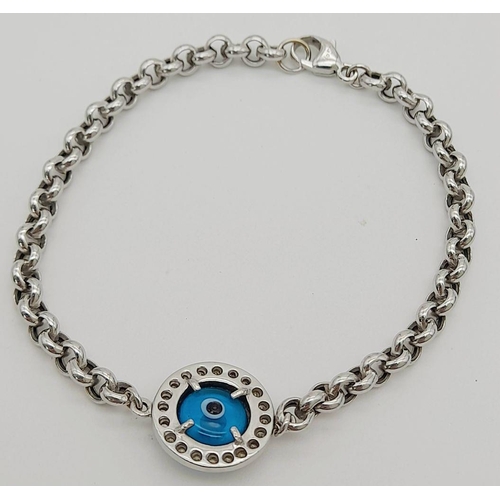 66 - AN 18K WHITE GOLD DIAMOND SET EVIL EYE BRACELET 14CM LENGTH, 4.2G TOTAL WEIGHT. Ref: SC 9007