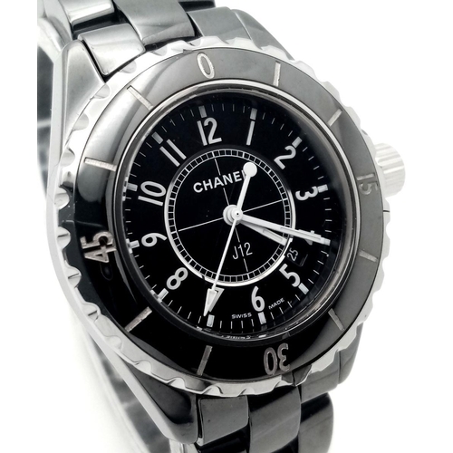 72 - A Chanel J12 Quartz Ladies Watch. Black ceramic bracelet and case - 35mm. Black dial with date windo... 