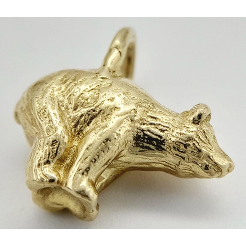 177 - A 9K YELLOW GOLD CHARM DEPICTING A BEAR SHITTING IN THE WOODS 4.9G TOTAL WEIGHT, 1.5CM x 1CM. Ref: S... 