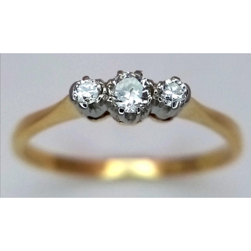 205 - AN 18K YELLOW GOLD DIAMOND THREE STONE RING 0.20CT , 1.7G TOTAL WEIGHT, SIZE N 1/2. Ref: SC 2051