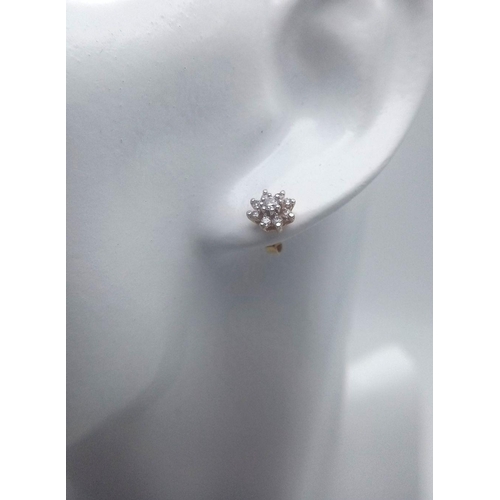 226 - A PAIR OF 14K YELLOW GOLD DIAMOND CLUSTER STUD EARRINGS 0.40CT , 1.5G TOTAL WEIGHT. Ref: SC 2042