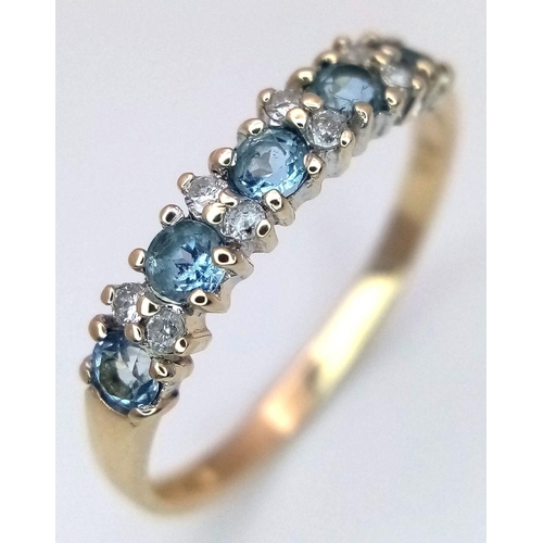 482 - A 9K YELLOW GOLD DIAMOND & BLUE TOPAZ RING 1.3G TOTAL WEIGHT, SIZE M. Ref: SC 2016