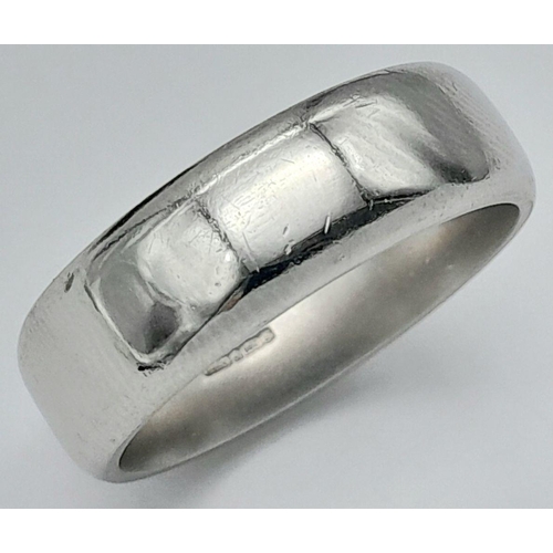 5 - A PLATINUM HEAVY COURT BAND RING. 17.5G. SIZE U. A/S1196