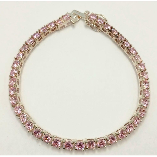 610 - A Sterling Silver and Pink Tourmaline Set Tennis Bracelet-19.5cm Length. The bracelet is set with Fo... 